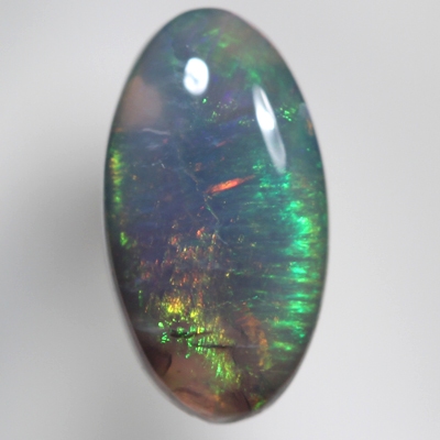 SOLID BLACK CRYSTAL OPAL Crisp green and orange with side flashes of red